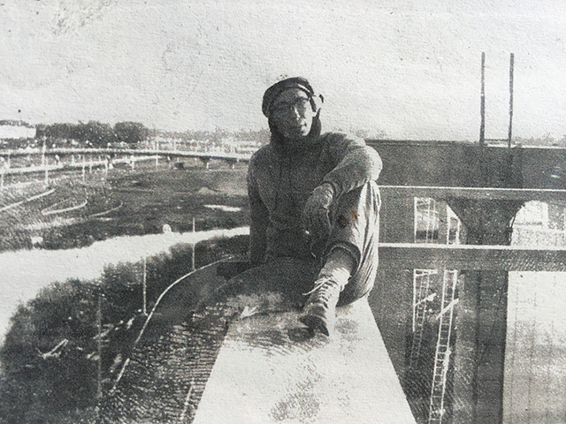 Dad on monorail beam.